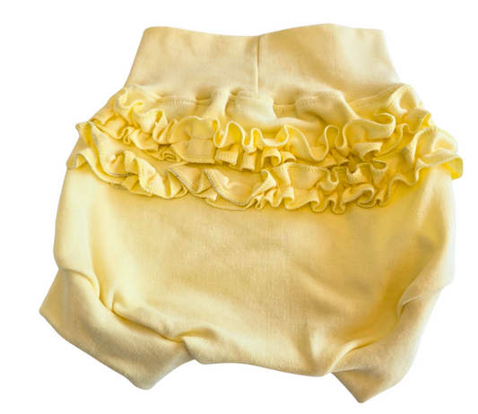 Yellow ruffled diaper cover on a white background