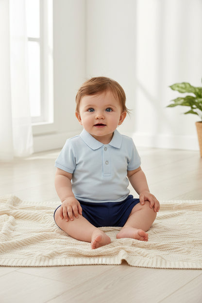 Baby wearing tab collar t shirt in baby blue