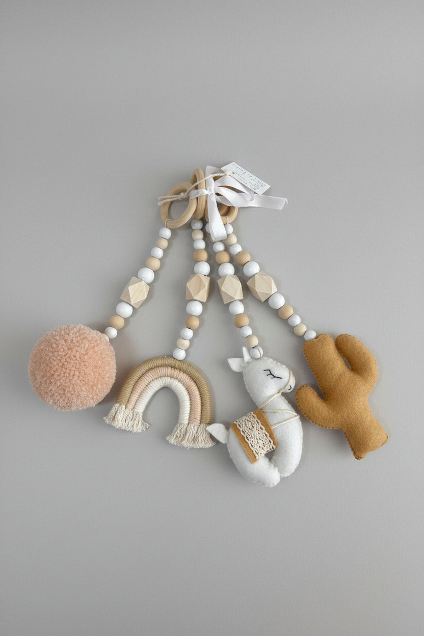 Baby gym dangle set consisting of a lama, rainbow, pom pom and Cactus