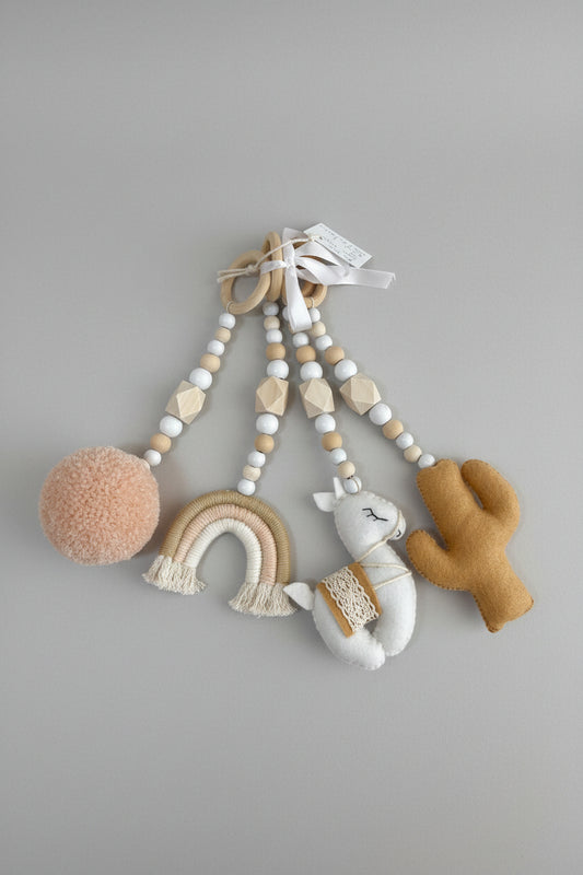 Baby gym dangle set consisting of a lama, rainbow, pom pom and Cactus