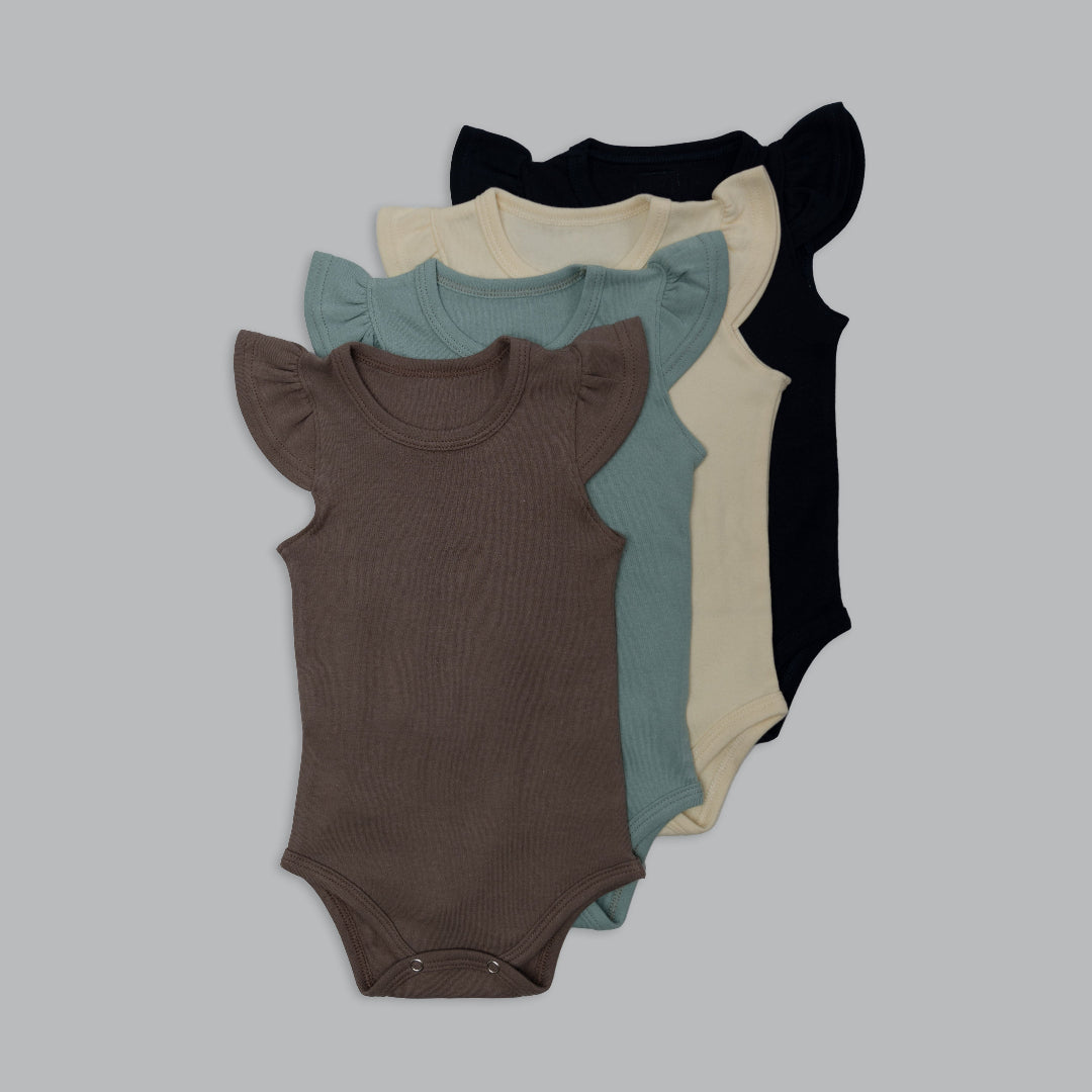 Four baby bodysuits in different colors on a light gray background