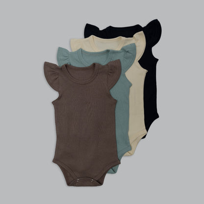 Four baby bodysuits in different colors on a light gray background