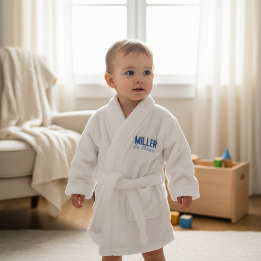 White robe with personalized embroidery with baby name
