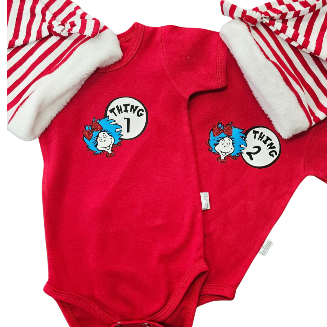 Red baby onesies with 'Thing 1' and 'Thing 2' designs on a white background